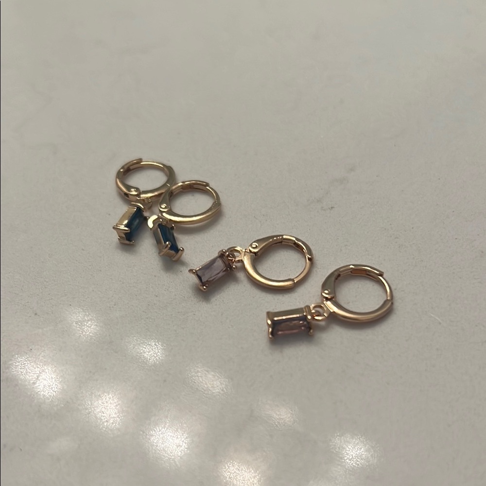 Gold Earrings, two sets, dangle earrings. Purple stones and blue stones.